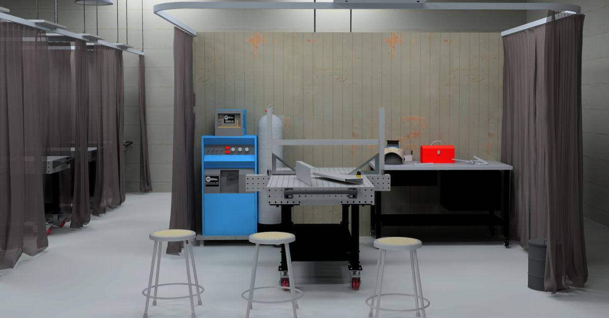 welding lab demo station with fixture table, stools and equipment for instructor demonstrations